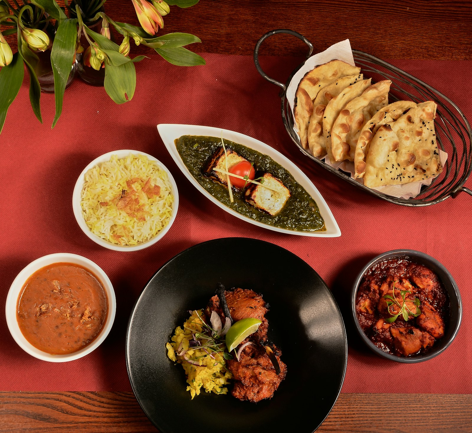 TRU India food shared at a table